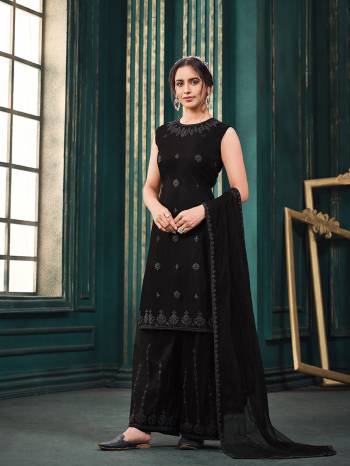 Attrective This Designer Long Length Suit In Lovely Color.Its Pretty Heavy Designer Thread,Sequance Embroidery Work Top Is Butterfly Net Based Paired With Satin Bottom And Butterfly Net Fabricated Dupatta Which Gives An Attractive To The Suit.