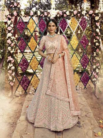 Garb This Bridal Heavy Designer Lehenga Choli In Fine Light Color Fabricated On Crepe Beautified Fabric Lahenga Choli With Heavy Designer Thread,Jari,Dori Embroidery Work.Buy Now. 