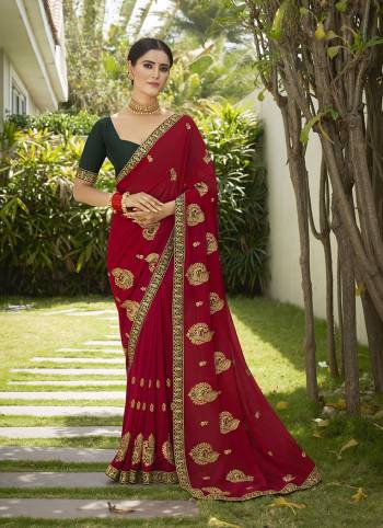 Celebrate This Wedding Season In This Very Pretty Colored Designer Embroidery Work Saree Paired With Contrasting Colored Blouse. This Saree Are Georgette and Blouse Are Silk Based Beautified With Detailed Embroidery. 