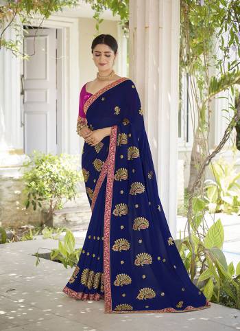 Celebrate This Wedding Season In This Very Pretty Colored Designer Embroidery Work Saree Paired With Contrasting Colored Blouse. This Saree Are Georgette and Blouse Are Silk Based Beautified With Detailed Embroidery. 