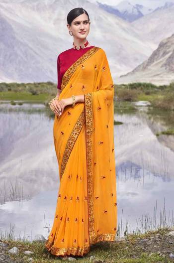 Look Attractive Wearing This Fine Colored Saree Paired With Contrasted Colored Blouse.  This Heavy Designer Butti Embroidey Work Saree Is Chiffon Based Which Gives A Rich Look To Your Personality. Buy This Pretty Saree Now.