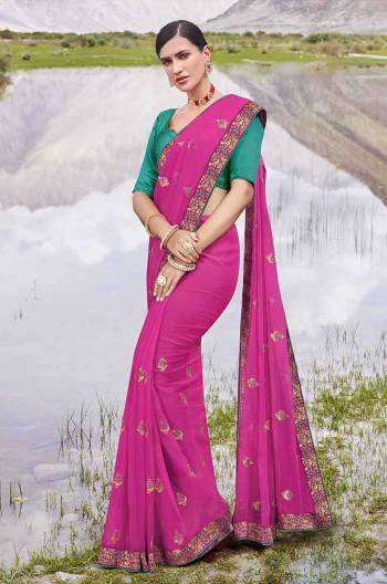 Look Attractive Wearing This Fine Colored Saree Paired With Contrasted Colored Blouse.  This Heavy Designer Butti Embroidey Work Saree Is Chiffon Based Which Gives A Rich Look To Your Personality. Buy This Pretty Saree Now.