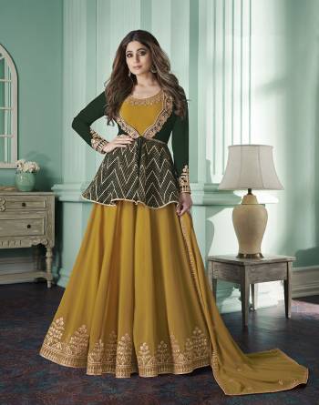 Stylist This Partywear Designer Long Length Suit In Lovely Color.Its Pretty Heavy Designer Jari,Sequance Embroidery Work Top Is Georgette Based Paired With Santoon Bottom And Georgette Fabricated Dupatta Which Gives An Attractive To The Suit.