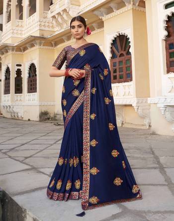 Grab This Pretty Elegant Looking Designer Saree In Fine Color Paired With Blouse. This Saree Are Vichitra Silk And Blouse Are Silk Jacquard Based Beautified With Embroidery Work. Buy Now.