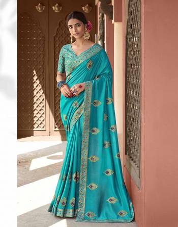 Grab This Pretty Elegant Looking Designer Saree In Fine Color Paired With Blouse. This Saree Are Vichitra Silk And Blouse Are Silk Jacquard Based Beautified With Embroidery Work. Buy Now.