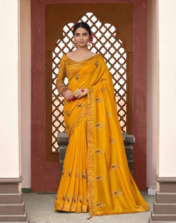 Grab This Pretty Elegant Looking Designer Saree In Fine Color Paired With Blouse. This Saree Are Vichitra Silk And Blouse Are Silk Jacquard Based Beautified With Embroidery Work. Buy Now.