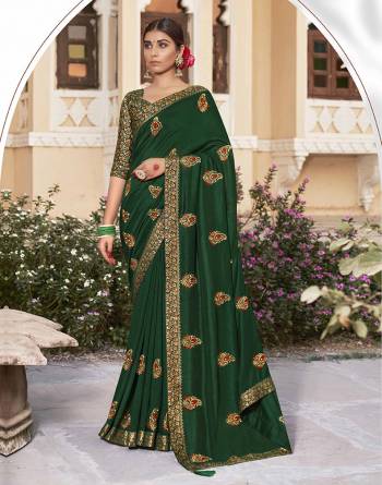 Grab This Pretty Elegant Looking Designer Saree In Fine Color Paired With Blouse. This Saree Are Vichitra Silk And Blouse Are Silk Jacquard Based Beautified With Embroidery Work. Buy Now.