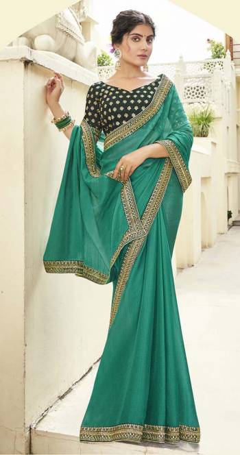 Looking The Pretty Angelic Look Wearing This Heavy Designer Saree With Contrasting Blouse. This Saree Is Fabricated On Shahi Chiffon Paired With Art Silk Fabricated Work Blouse. Its Pretty Color Pallete Will Give An Attractive Look To Your Personality. 