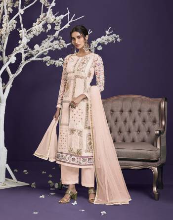 Attrective This Designer Long Length Suit In Lovely Light Color.Its Pretty Heavy Designer Thread,Jari,Sequance Embroidery Work Top Is Georgette Based Paired With Dull Santoon Bottom And Net Fabricated Dupatta Which Gives An Attractive To The Suit.