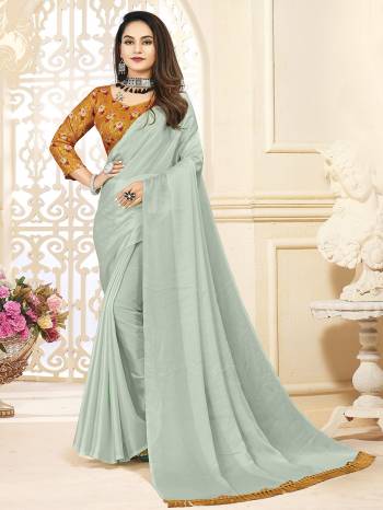 Looking This Designer Partywear Saree Are Fine Saree Paired With Contrasted Blouse.This Saree Are Satin Silk And Blouse Are Art Silk Based Fabric With Designer Printed With Sequance Embroidery Work. Buy This Pretty Saree Now.