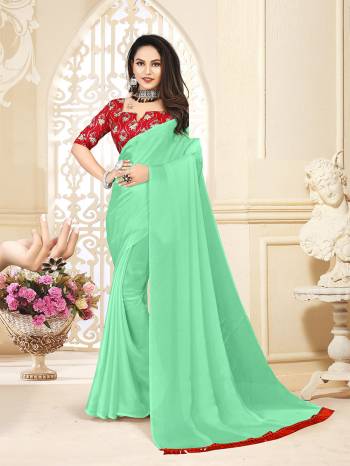 Looking This Designer Partywear Saree Are Fine Saree Paired With Contrasted Blouse.This Saree Are Satin Silk And Blouse Are Art Silk Based Fabric With Designer Printed With Sequance Embroidery Work. Buy This Pretty Saree Now.