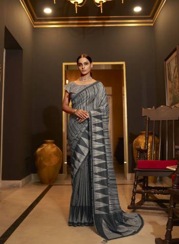 Looking This Stylist Partywear Saree Are Fine Saree Paired With Blouse.This Saree And Blouse Are Silk Fabric With Designer Jari Weaving Work And Digital Printed. Buy This Pretty Saree Now.