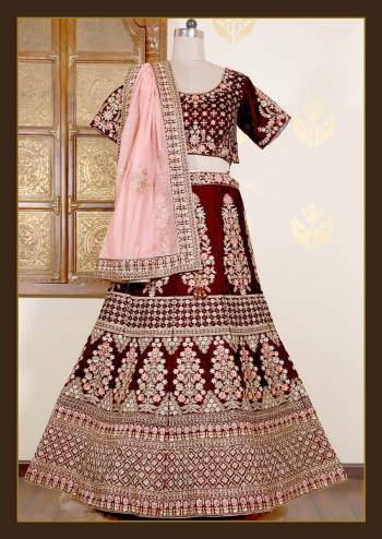 Look Attrective This Wedding Partywear Heavy Designer Lehenga Choli And Dupatta In Fine Color Fabricated On Velvet Beautified With Heavy Attractive Cord,Thread,Jari Embroidery And Hand Work. 