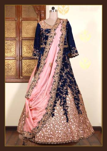 Look Attrective This Wedding Partywear Heavy Designer Lehenga Choli And Dupatta In Fine Color Fabricated On Velvet Beautified With Heavy Attractive Cord,Thread,Jari Embroidery Work. 