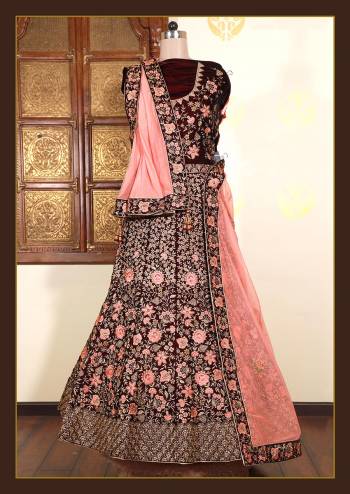 Look Attrective This Wedding Partywear Heavy Designer Lehenga Choli And Dupatta In Fine Color Fabricated On Velvet Beautified With Heavy Attractive Thread,Jari Embroidery And Hand Work. 