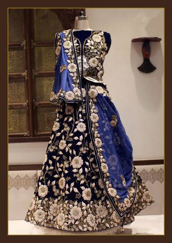 Look Attrective This Wedding Partywear Heavy Designer Lehenga Choli And Dupatta In Fine Color Fabricated On Velvet Beautified With Heavy Attractive Cord,Jari And Sequance Embroidery Work. 