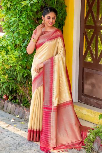 Classic Designer Partywear Saree Are Fine Color Paired With Blouse.This Saree And Blouse Are South Cotton Based Fabric With Heavy Wevon Jari And Temple Pallu Border Tassels Designer. Buy This Pretty Saree Now.