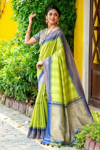 Classic Designer Partywear Saree Are Fine Color Paired With Blouse.This Saree And Blouse Are South Cotton Based Fabric With Heavy Wevon Jari And Temple Pallu Border Tassels Designer. Buy This Pretty Saree Now.