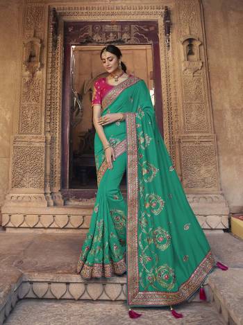 Garb This Pretty Angelic Patan Wearing This Heavy Designer Embroidery Work Saree In Fine Color Paired With Blouse. This Saree Satin Georgette And Blouse Is Fabricated on Art Silk Paired. Its Attractive Look To Your Personality. 