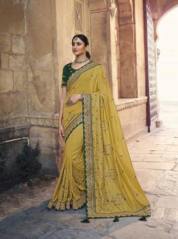 Garb This Pretty Angelic Patan Wearing This Heavy Designer Embroidery Work Saree In Fine Color Paired With Blouse. This Saree Satin Georgette And Blouse Is Fabricated on Art Silk Paired. Its Attractive Look To Your Personality. 