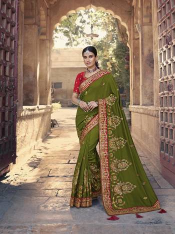 Garb This Pretty Angelic Patan Wearing This Heavy Designer Embroidery Work Saree In Fine Color Paired With Blouse. This Saree Satin Georgette And Blouse Is Fabricated on Art Silk Paired. Its Attractive Look To Your Personality. 