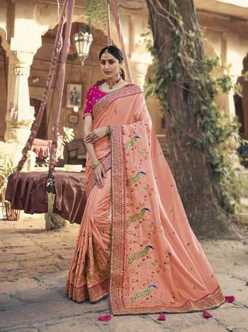 Garb This Pretty Angelic Patan Wearing This Heavy Designer Embroidery Work Saree In Fine Color Paired With Blouse. This Saree Satin Georgette And Blouse Is Fabricated on Art Silk Paired. Its Attractive Look To Your Personality. 