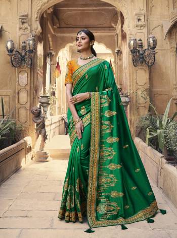 Garb This Pretty Angelic Patan Wearing This Heavy Designer Embroidery Work Saree In Fine Color Paired With Blouse. This Saree Satin Georgette And Blouse Is Fabricated on Art Silk Paired. Its Attractive Look To Your Personality. 