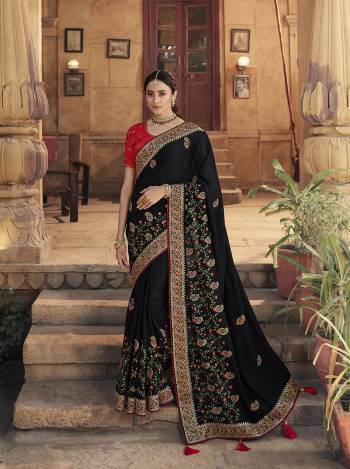 Garb This Pretty Angelic Patan Wearing This Heavy Designer Embroidery Work Saree In Fine Color Paired With Blouse. This Saree Satin Georgette And Blouse Is Fabricated on Art Silk Paired. Its Attractive Look To Your Personality. 