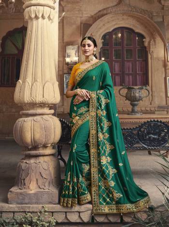 Garb This Pretty Angelic Patan Wearing This Heavy Designer Embroidery Work Saree In Fine Color Paired With Blouse. This Saree Satin Georgette And Blouse Is Fabricated on Art Silk Paired. Its Attractive Look To Your Personality. 