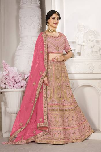 Garb This Bridal Heavy Designer Lehenga Choli In Fine lovely Color Fabricated On Choli Raw Silk Beautified Fabric Lahenga Are Silk With Heavy Designer Thread,Jari,Dori Embroidery And Khatli Work.Buy Now. 