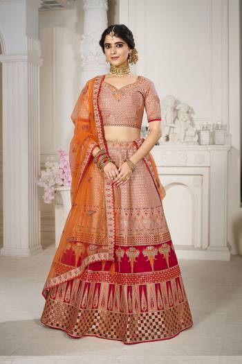 Garb This Bridal Heavy Designer Lehenga Choli In Fine lovely Color Fabricated On Choli Raw Silk Beautified Fabric Lahenga Are Silk With Heavy Designer Thread,Jari,Dori Embroidery And Khatli Work.Buy Now. 