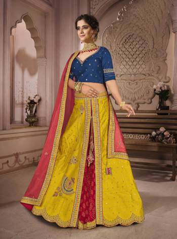 Garb This Bridal Heavy Designer Lehenga Choli In Fine lovely Color Fabricated On Choli Raw Silk Beautified Fabric Lahenga Are Silk With Heavy Designer Thread,Jari,Dori Embroidery And Khatli Work.Buy Now. 