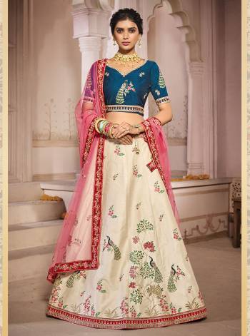 Attrective This Bridal Heavy Designer Lehenga Choli In Fine lovely Color Fabricated On Choli Raw Silk Beautified Fabric Lahenga Are Silk With Heavy Designer Thread,Jari,Dori Embroidery And Khatli Work.Buy Now. 