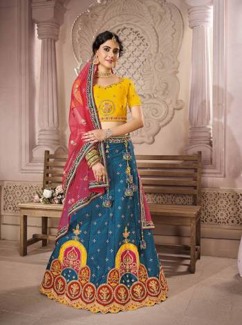 Attrective This Bridal Heavy Designer Lehenga Choli In Fine lovely Color Fabricated On Choli Raw Silk Beautified Fabric Lahenga Are Silk With Heavy Designer Thread,Jari,Dori Embroidery And Khatli Work.Buy Now. 