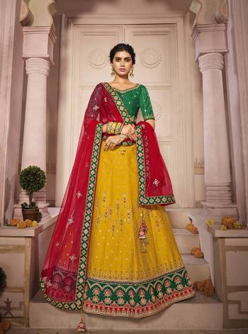 Attrective This Bridal Heavy Designer Lehenga Choli In Fine lovely Color Fabricated On Choli Raw Silk Beautified Fabric Lahenga Are Silk With Heavy Designer Thread,Jari,Dori Embroidery And Khatli Work.Buy Now. 