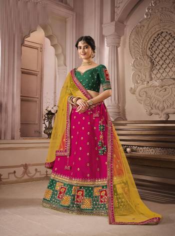 Attrective This Bridal Heavy Designer Lehenga Choli In Fine lovely Color Fabricated On Choli Raw Silk Beautified Fabric Lahenga Are Silk With Heavy Designer Thread,Jari,Dori Embroidery And Khatli Work.Buy Now. 