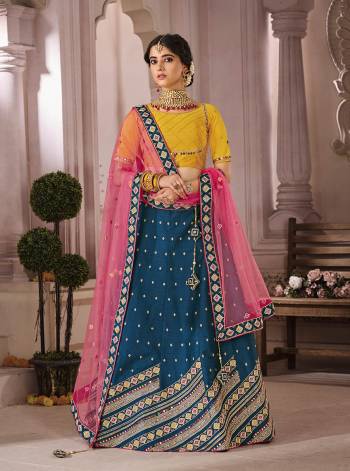 Attrective This Bridal Heavy Designer Lehenga Choli In Fine lovely Color Fabricated On Choli Raw Silk Beautified Fabric Lahenga Are Silk With Heavy Designer Thread,Jari,Dori Embroidery And Khatli Work.Buy Now. 