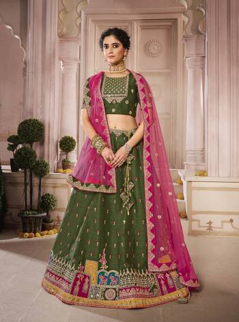 Attrective This Bridal Heavy Designer Lehenga Choli In Fine lovely Color Fabricated On Choli Raw Silk Beautified Fabric Lahenga Are Silk With Heavy Designer Thread,Jari,Dori Embroidery And Khatli Work.Buy Now. 