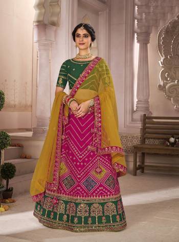 Attrective This Bridal Heavy Designer Lehenga Choli In Fine lovely Color Fabricated On Choli Raw Silk Beautified Fabric Lahenga Are Silk With Heavy Designer Thread,Jari,Dori Embroidery And Khatli Work.Buy Now. 