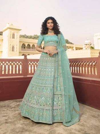 Looking This Bridal Heavy Designer Lehenga Choli In Fine Light Color Fabricated On Organza Beautified Fabric With Heavy Designer Sequance,Thread,Jari,Dori Embroidery Work.Buy Now. 