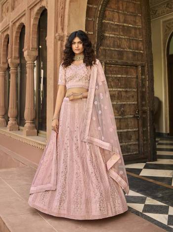 Looking This Bridal Heavy Designer Lehenga Choli In Fine Light Color Fabricated On Satin Beautified Fabric With Heavy Designer Sequance,Thread,Jari,Dori Embroidery Work.Buy Now. 