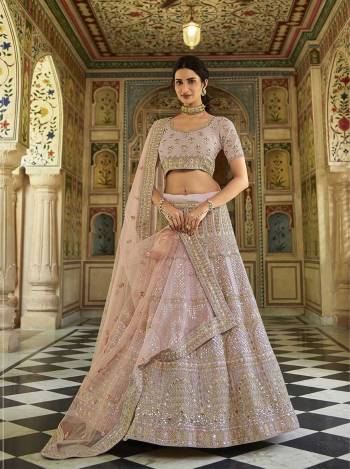 Looking This Bridal Heavy Designer Lehenga Choli In Fine Light Color Fabricated On Organza Beautified Fabric With Heavy Designer Sequance,Thread,Jari,Dori Embroidery Work.Buy Now. 