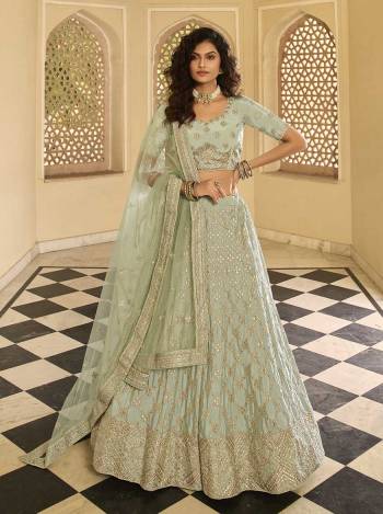 Looking This Bridal Heavy Designer Lehenga Choli In Fine Light Color Fabricated On Crepe Beautified Fabric With Heavy Designer Sequance,Thread,Jari,Dori Embroidery Work.Buy Now. 