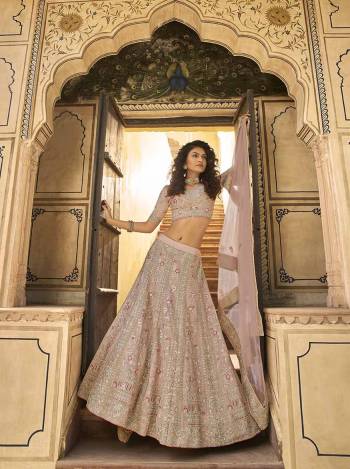 Looking This Bridal Heavy Designer Lehenga Choli In Fine Light Color Fabricated On Organza Beautified Fabric With Heavy Designer Sequance,Thread,Jari,Dori Embroidery Work.Buy Now. 