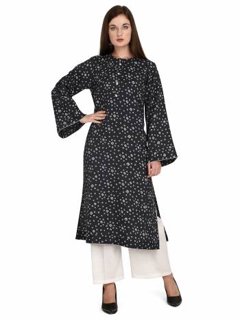 Attrective This Readymade Long Kurti With Bottom In Fine Color Fabricated On Rayon Beautified With Designer Printed. It Is Light In Weight And Easy To Carry All Day Long. 