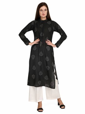 Attrective This Readymade Long Kurti With Bottom In Fine Color Fabricated On Rayon Beautified With Designer Printed. It Is Light In Weight And Easy To Carry All Day Long. 