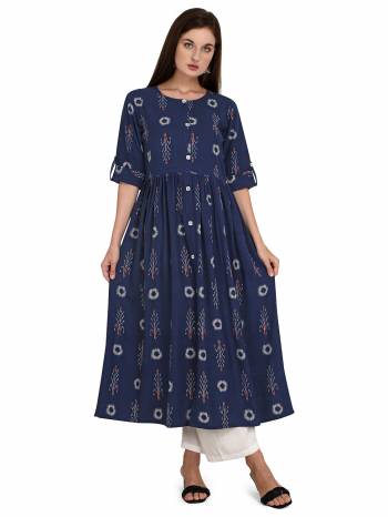 Attrective This Readymade Long Kurti With Bottom In Fine Color Fabricated On Rayon Beautified With Designer Printed. It Is Light In Weight And Easy To Carry All Day Long. 