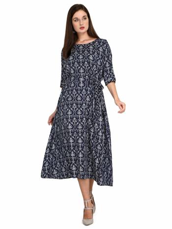 Attrective This Readymade Long Kurti In Fine Color Fabricated On Rayon Beautified With Designer Printed. It Is Light In Weight And Easy To Carry All Day Long. 