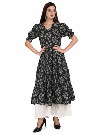 Attrective This Readymade Long Kurti With Bottom In Fine Color Fabricated On Rayon Beautified With Designer Printed. It Is Light In Weight And Easy To Carry All Day Long. 