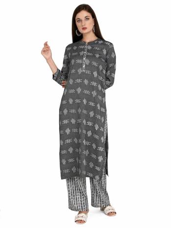Attrective This Readymade Long Kurti With Bottom In Fine Color Fabricated On Rayon Beautified With Designer Printed. It Is Light In Weight And Easy To Carry All Day Long. 